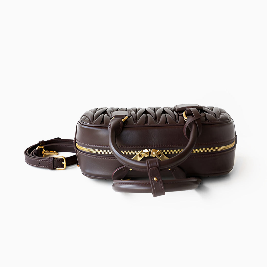 <tc>Piper 플리츠 크로스백</tc>