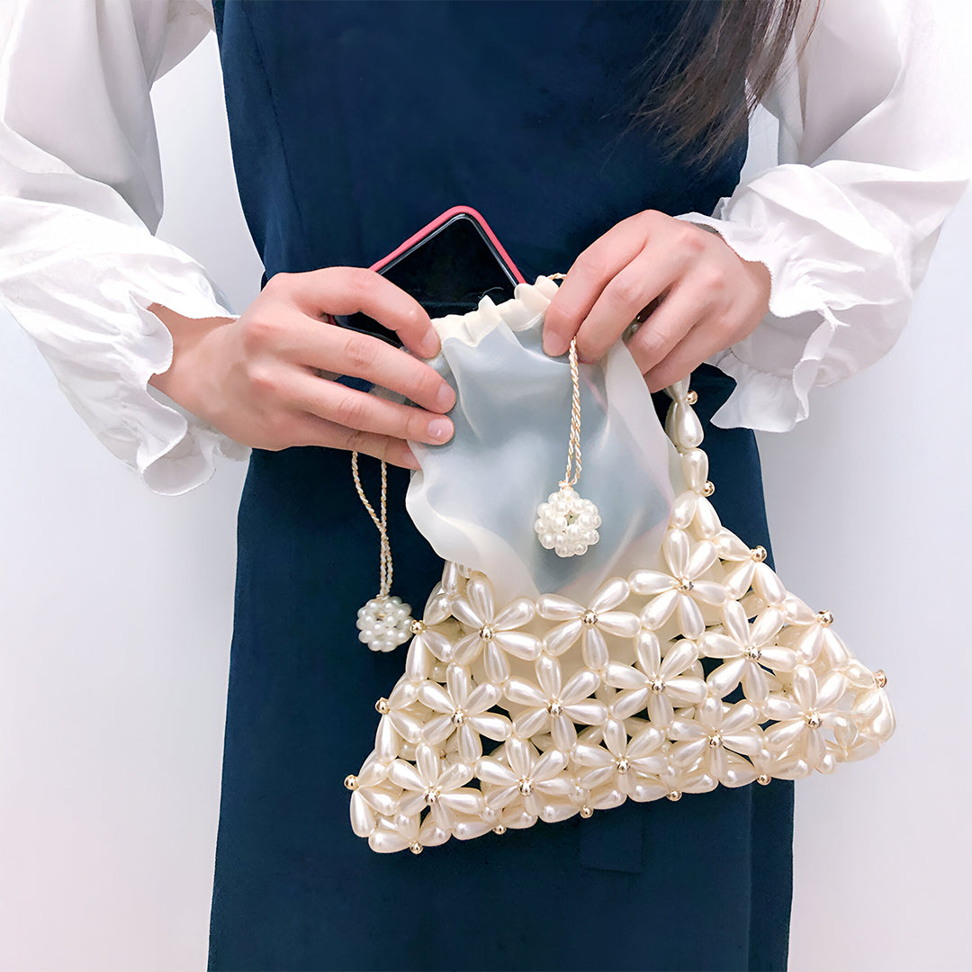 <tc>Vicky 진주 핸드백</tc>