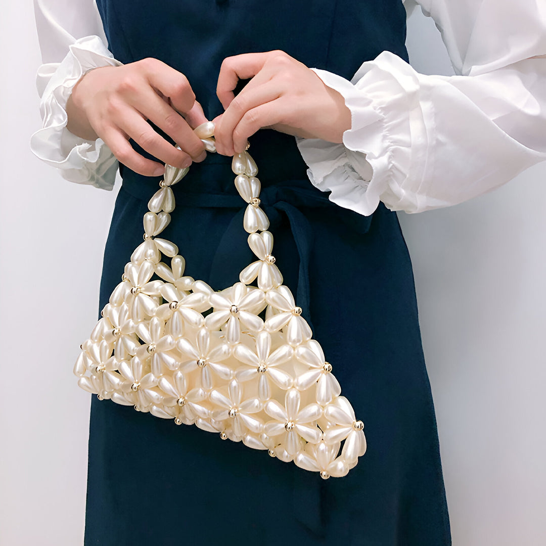 <tc>Vicky 진주 핸드백</tc>