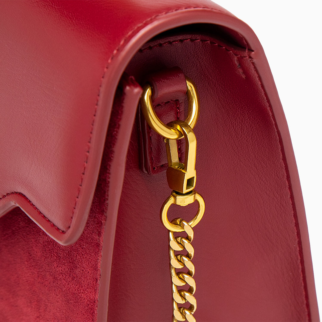 Regal Charm Suede Handbag